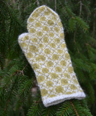 Zoom bild av stickbeskrivning vante stjärnglimm ullcentrum