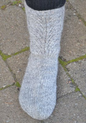 Zoom bild av mönster sockor med spets ullcentrum