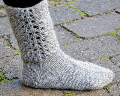 Zoom bild av mönster sockor med spets ullcentrum