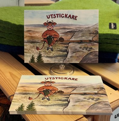 Zoom bild av vykort ko ute