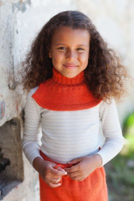 Zoom bild av mönster barn mössa vantar olle rauma