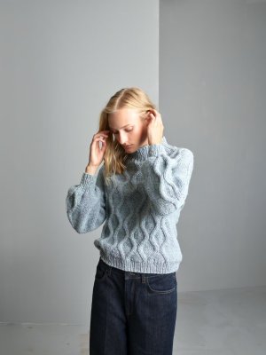 Zoom bild av mönster rauma vams tröja hösttröja