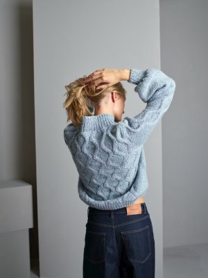 Zoom bild av mönster rauma vams tröja hösttröja