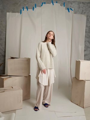 Zoom bild av stickbeskrivning lun sommergenser rauma