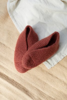 Zoom bild av mönster rauma tofflor stickning ullgarn