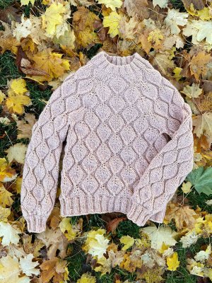 Zoom bild av mönster tröja rauma vams ullgarn stickning