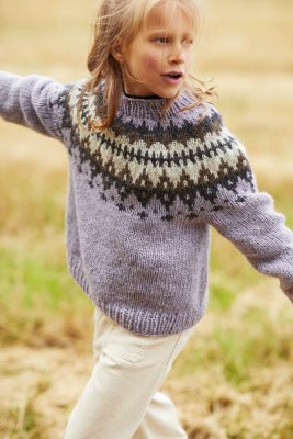 Zoom bild av mönster barntröja vams rauma stickning