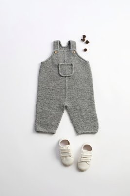 Zoom bild av stickmönster bompi byxa barn rauma babygarn