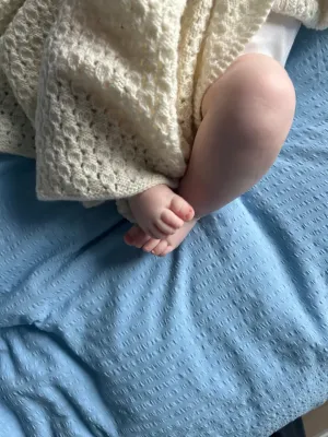 Zoom bild av mönster bäbisfilt teppe filt baby