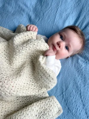 Zoom bild av mönster bäbisfilt teppe filt baby