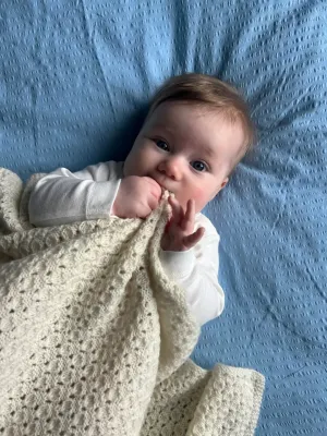 Zoom bild av mönster bäbisfilt teppe filt baby