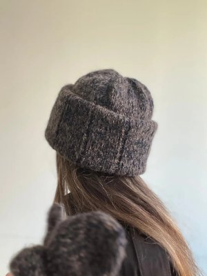 Zoom bild av mössa lue tweedlue
