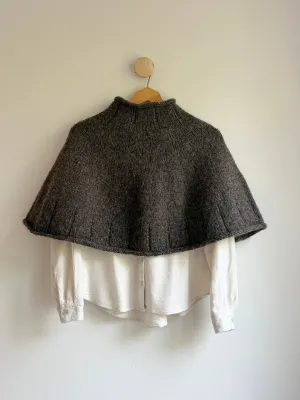 Zoom bild av mönster poncho tweed