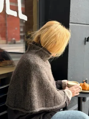 Zoom bild av mönster poncho tweed