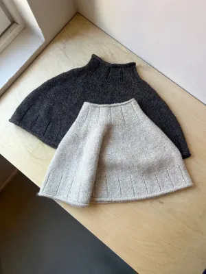 Zoom bild av mönster poncho tweed