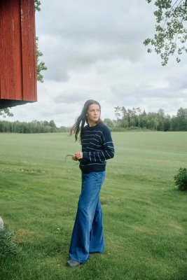 Zoom bild av mönster tröja norsk merinoull