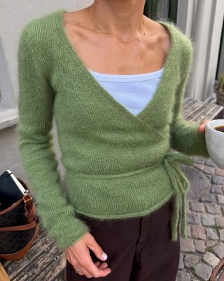 Zoom bild av mönster kofta omlott knytmodell
