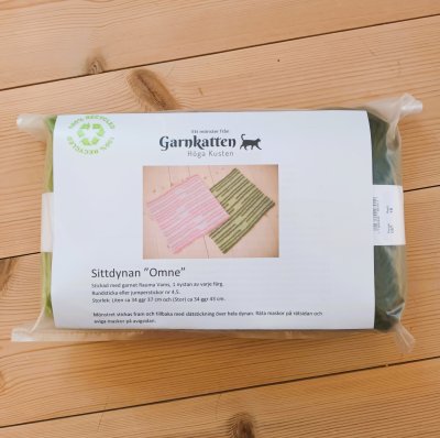 Zoom bild av Mönsterkit sittdynan omne garn stickning