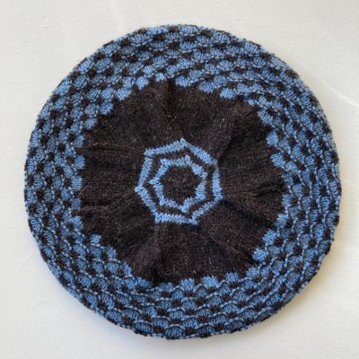 Zoom bild av mönster uradale yarns seto tam mössa